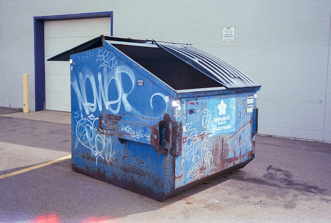 Dumpster covered in graffiti. (Olympus Stylus Epic)